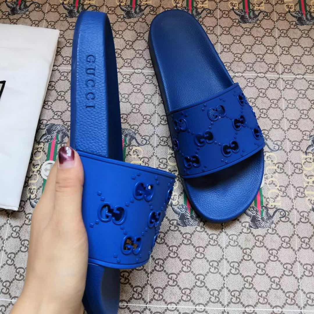 Gucci Rubber GG Slide Sandal In Blue - DesignerGu