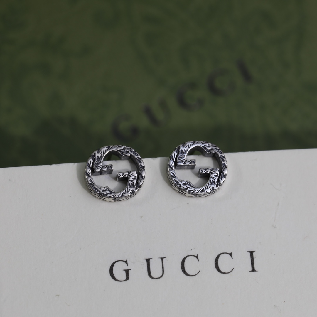 Gucci Interlocking G earrings In Silver - DesignerGu