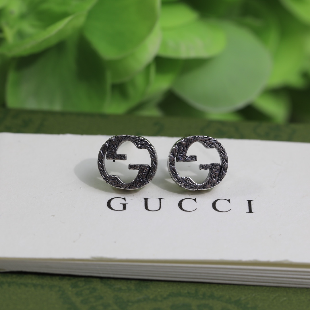 Gucci Interlocking G earrings In Silver - DesignerGu