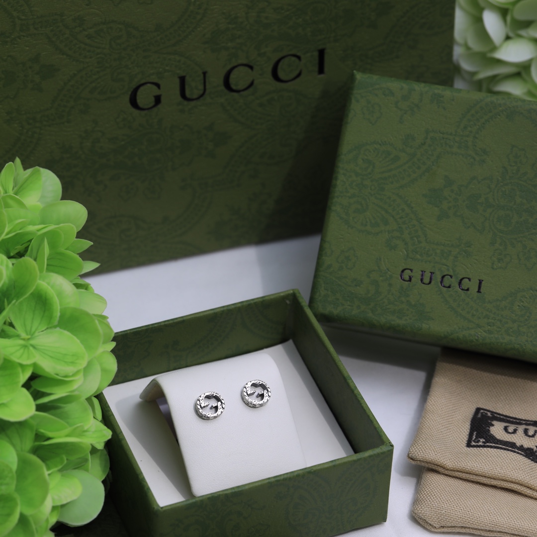 Gucci Interlocking G earrings In Silver - DesignerGu