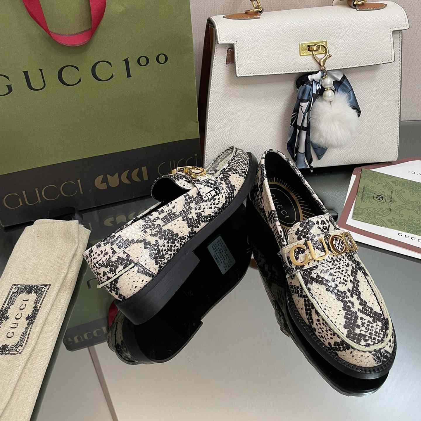 Gucci Women's Gucci Python Print Loafer - DesignerGu