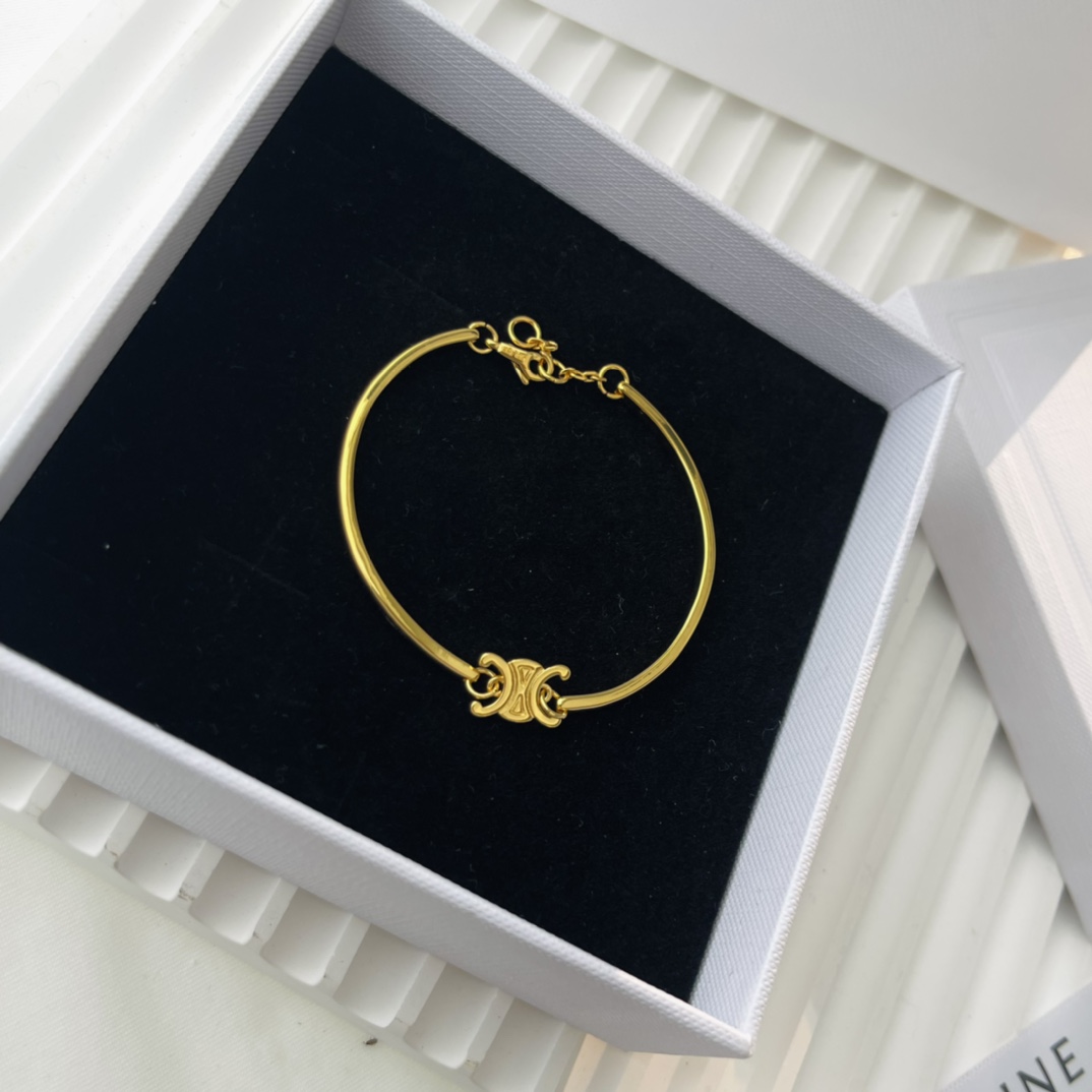 Celine Triomphe Articulated Bracelet In Brass With Gold Finish - DesignerGu