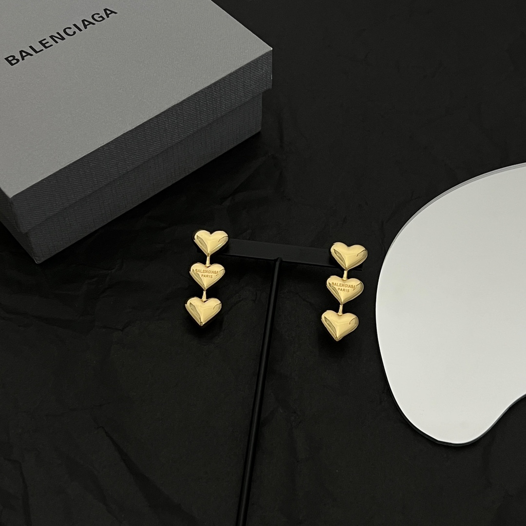 Balenciaga Women's Heart Earrings In Gold - DesignerGu