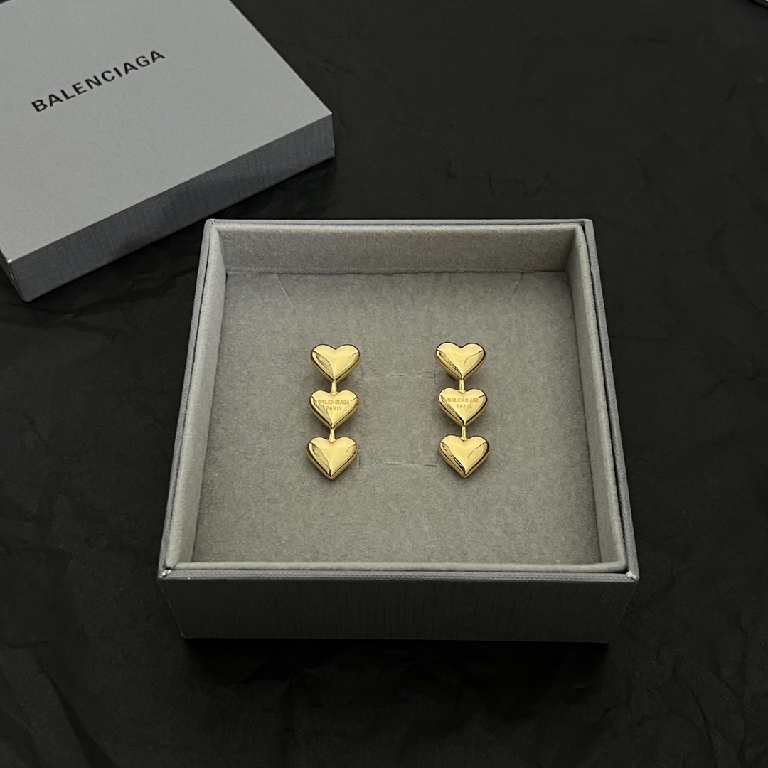 Balenciaga Women's Heart Earrings In Gold - DesignerGu