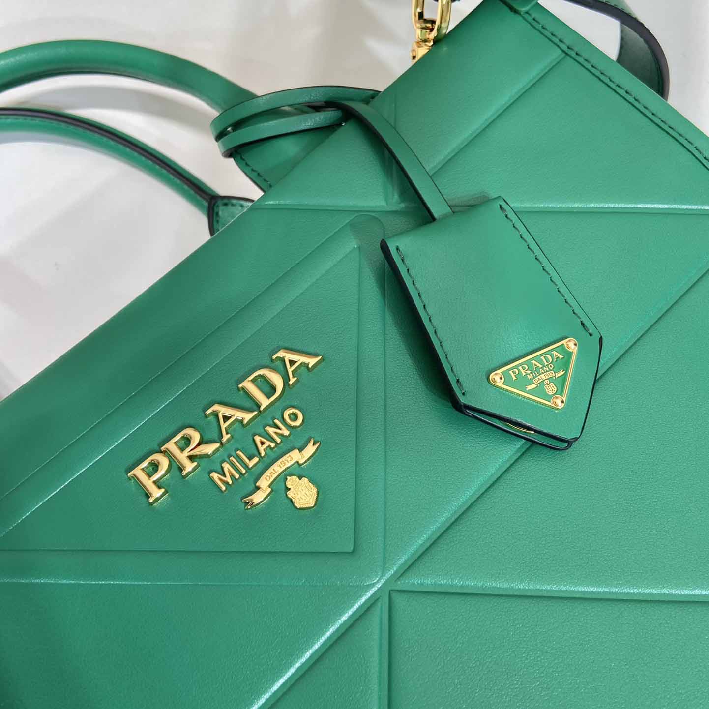 Prada Small Leather Prada Symbole Bag With Topstitching - DesignerGu