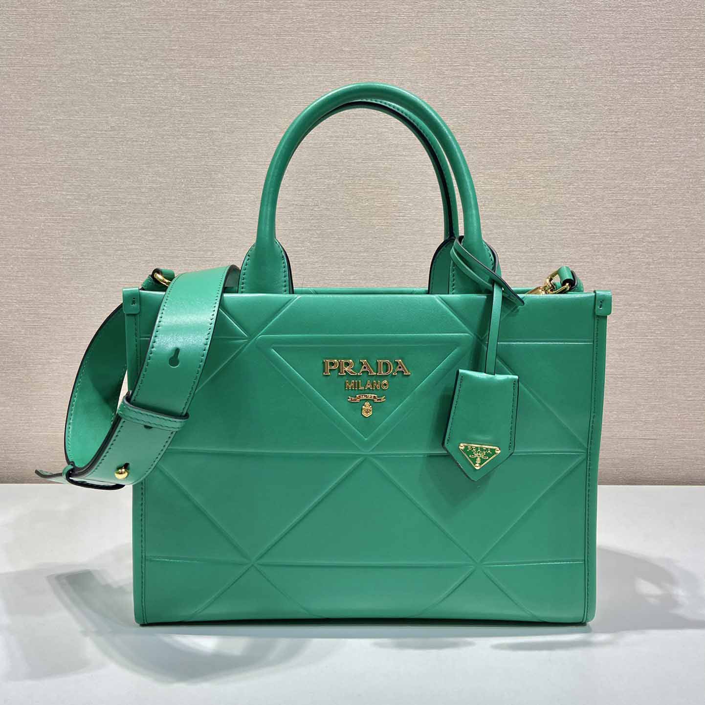 Prada Small Leather Prada Symbole Bag With Topstitching - DesignerGu