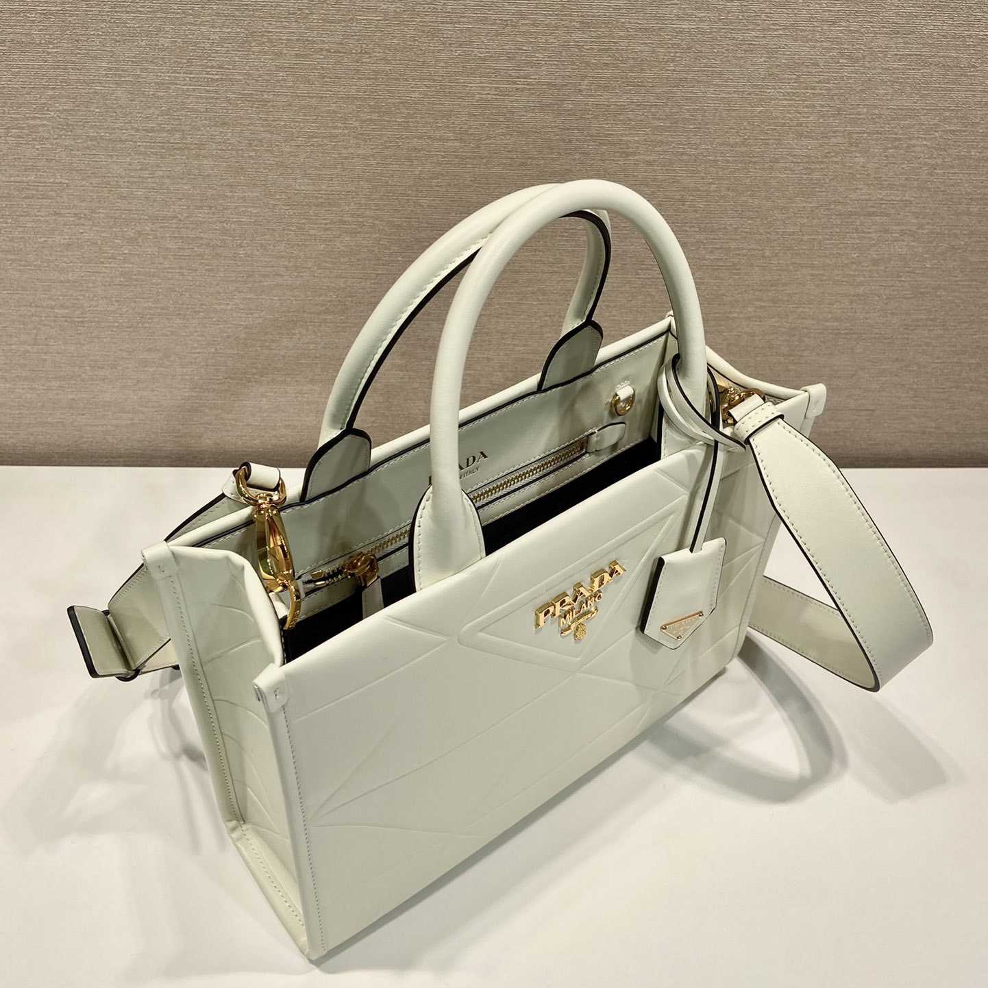 Prada Small Leather Prada Symbole Bag With Topstitching - DesignerGu