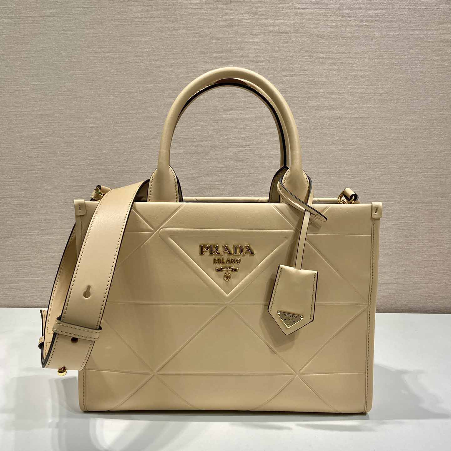 Prada Small Leather Prada Symbole Bag With Topstitching - DesignerGu