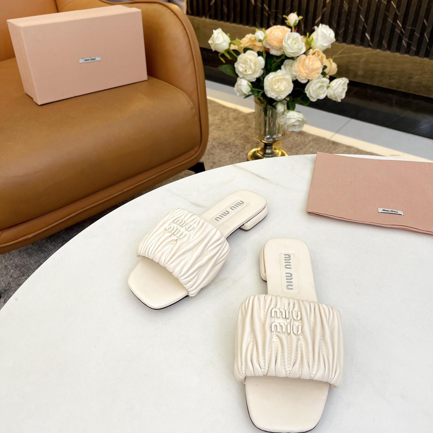 Miu Miu Matelassé Nappa Leather Slides - DesignerGu