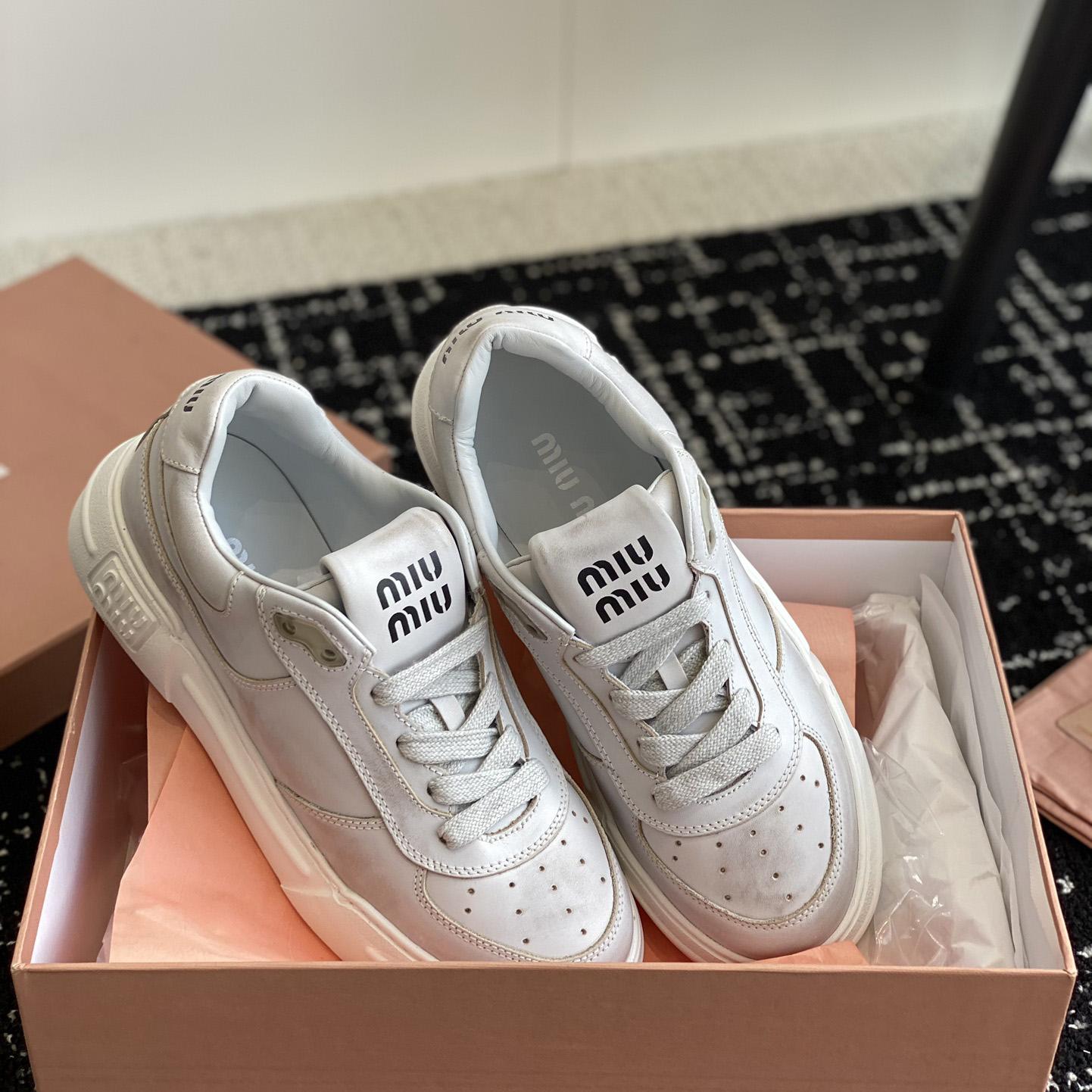 Miu Miu Bleached Leather Sneakers - DesignerGu