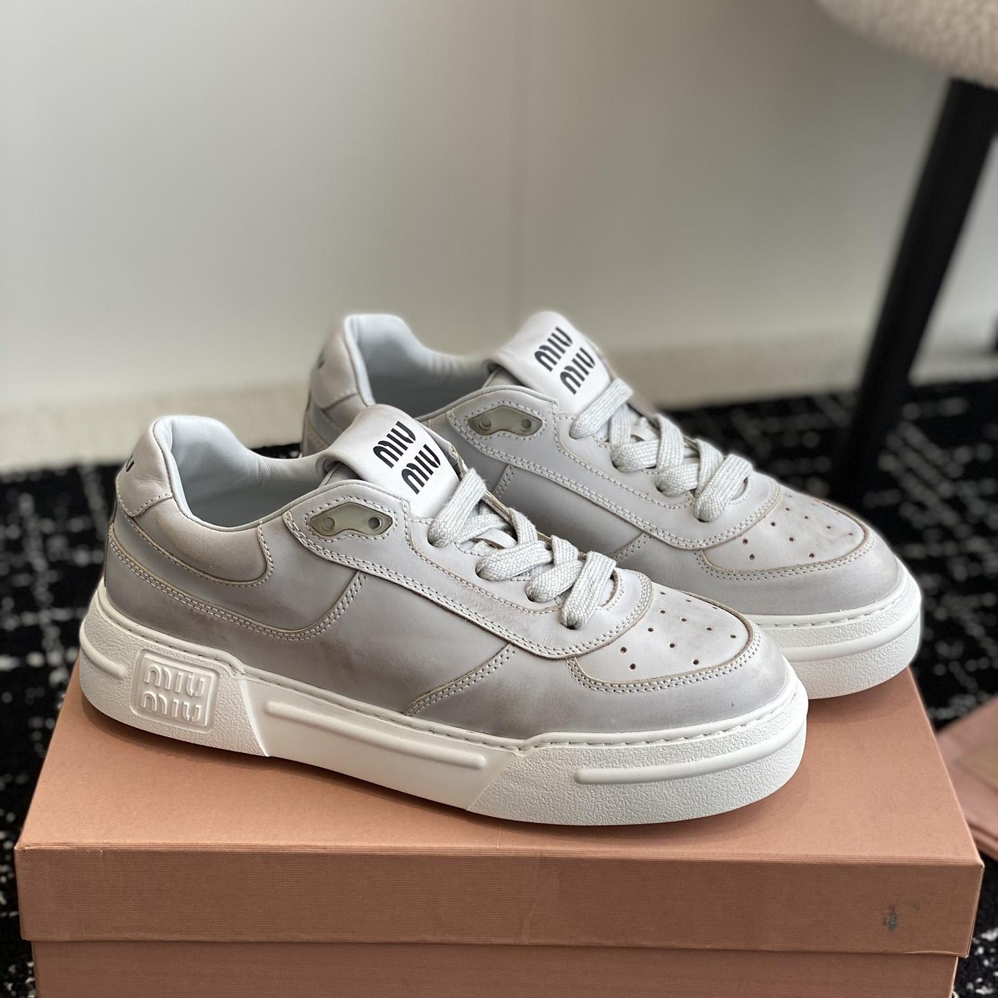 Miu Miu Bleached Leather Sneakers - DesignerGu