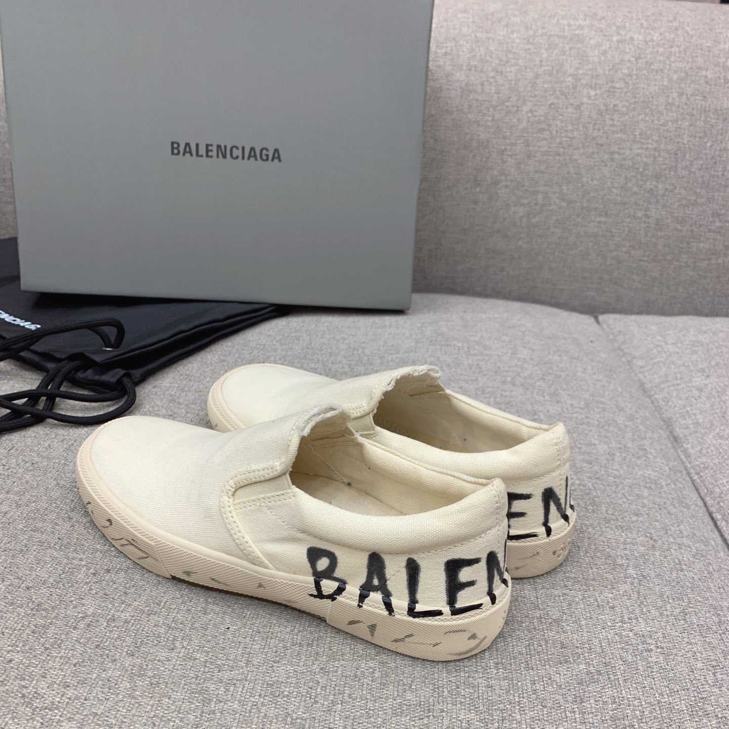 Balenciaga Paris Slip On Graffiti Sneaker In White  - DesignerGu