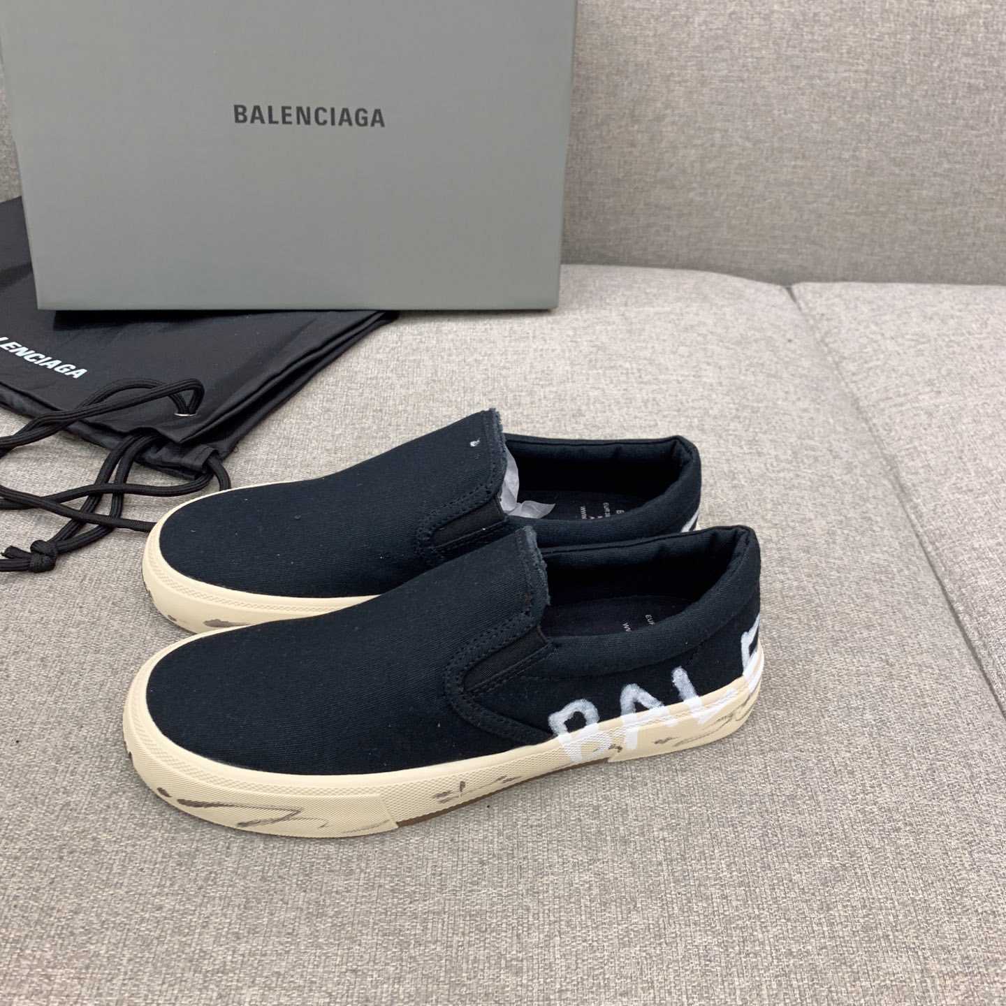 Balenciaga Paris Slip On Graffiti Sneaker In Black - DesignerGu