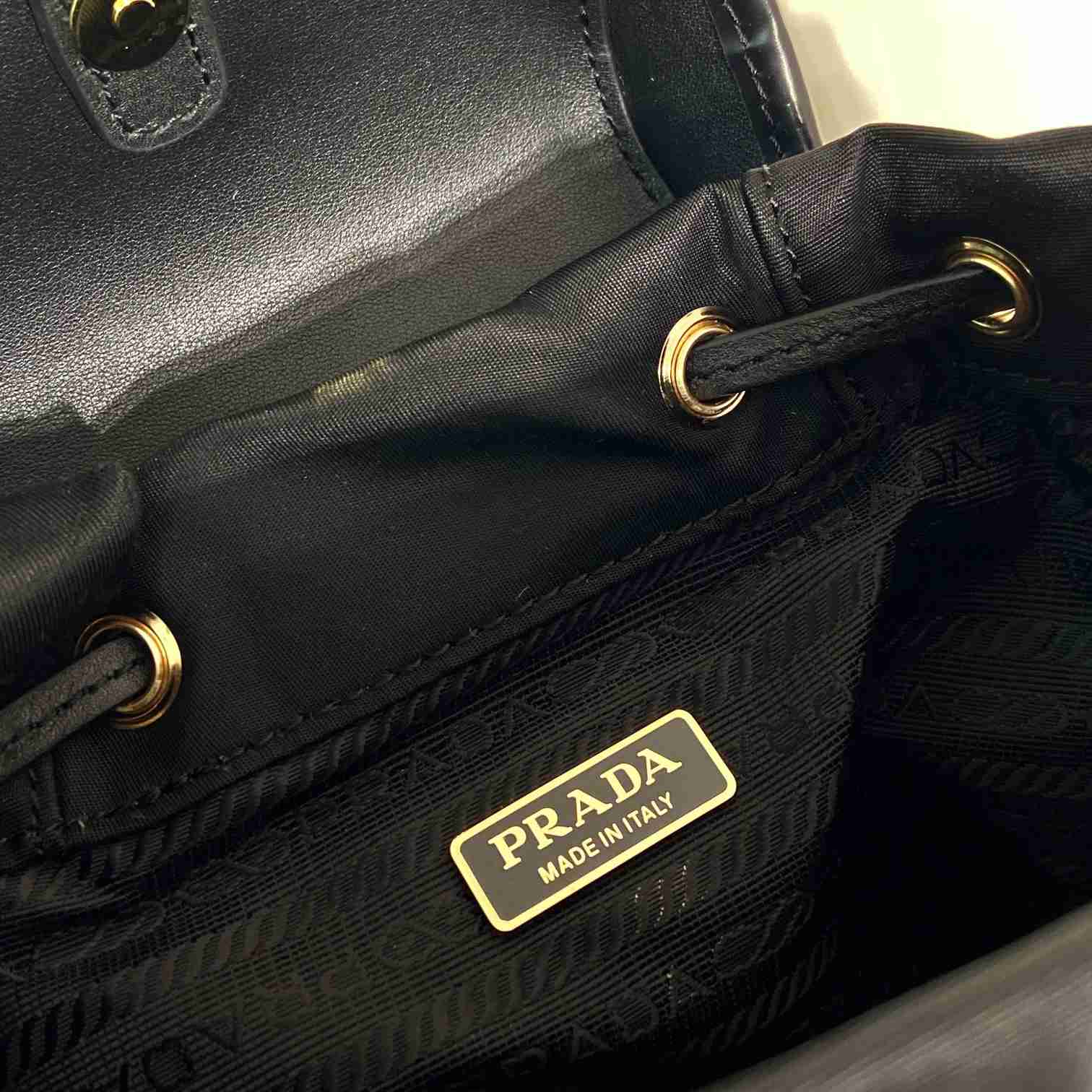 Prada Small Re-Nylon And Brushed Leather Backpack - DesignerGu