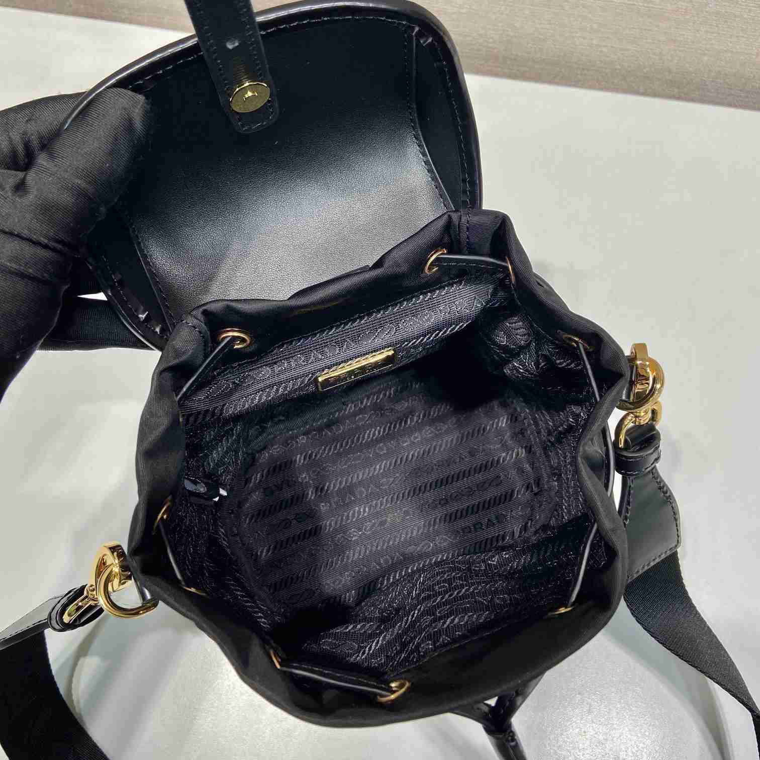 Prada Small Re-Nylon And Brushed Leather Backpack - DesignerGu