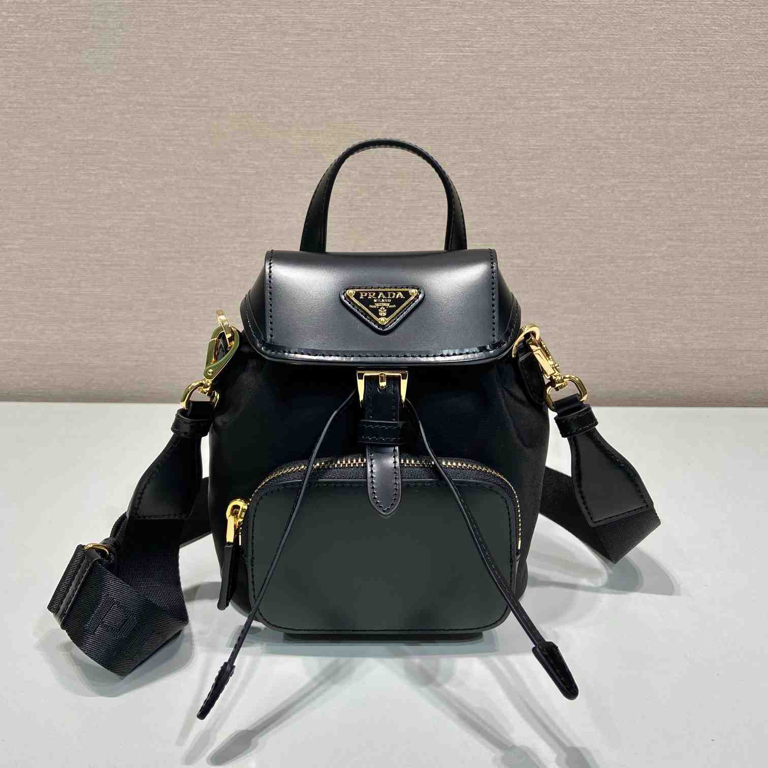 Prada Small Re-Nylon And Brushed Leather Backpack - DesignerGu