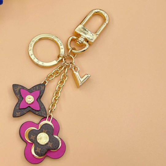 Louis Vuitton Blooming Flowers Bag Charm and Key Holder   M63084 - DesignerGu