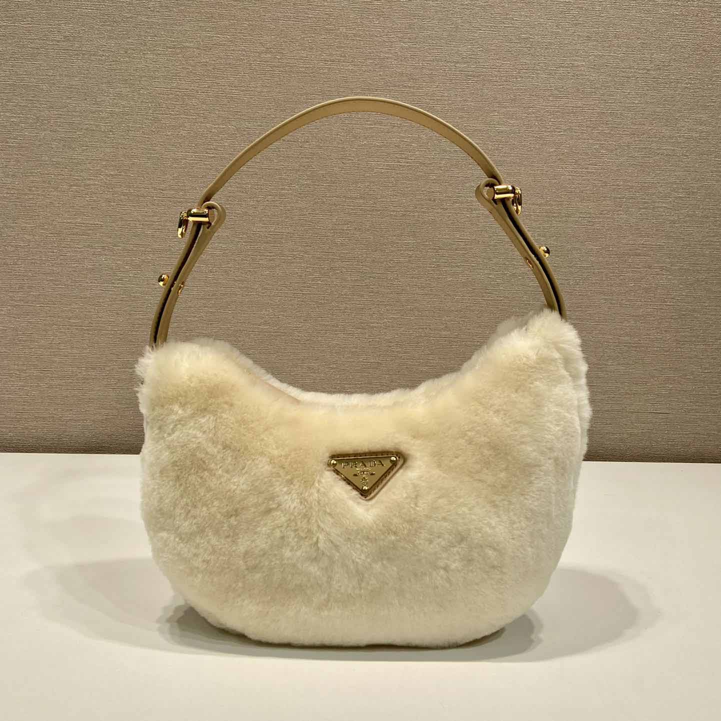 Prada Arqué Shearling And Leather Shoulder Bag - DesignerGu