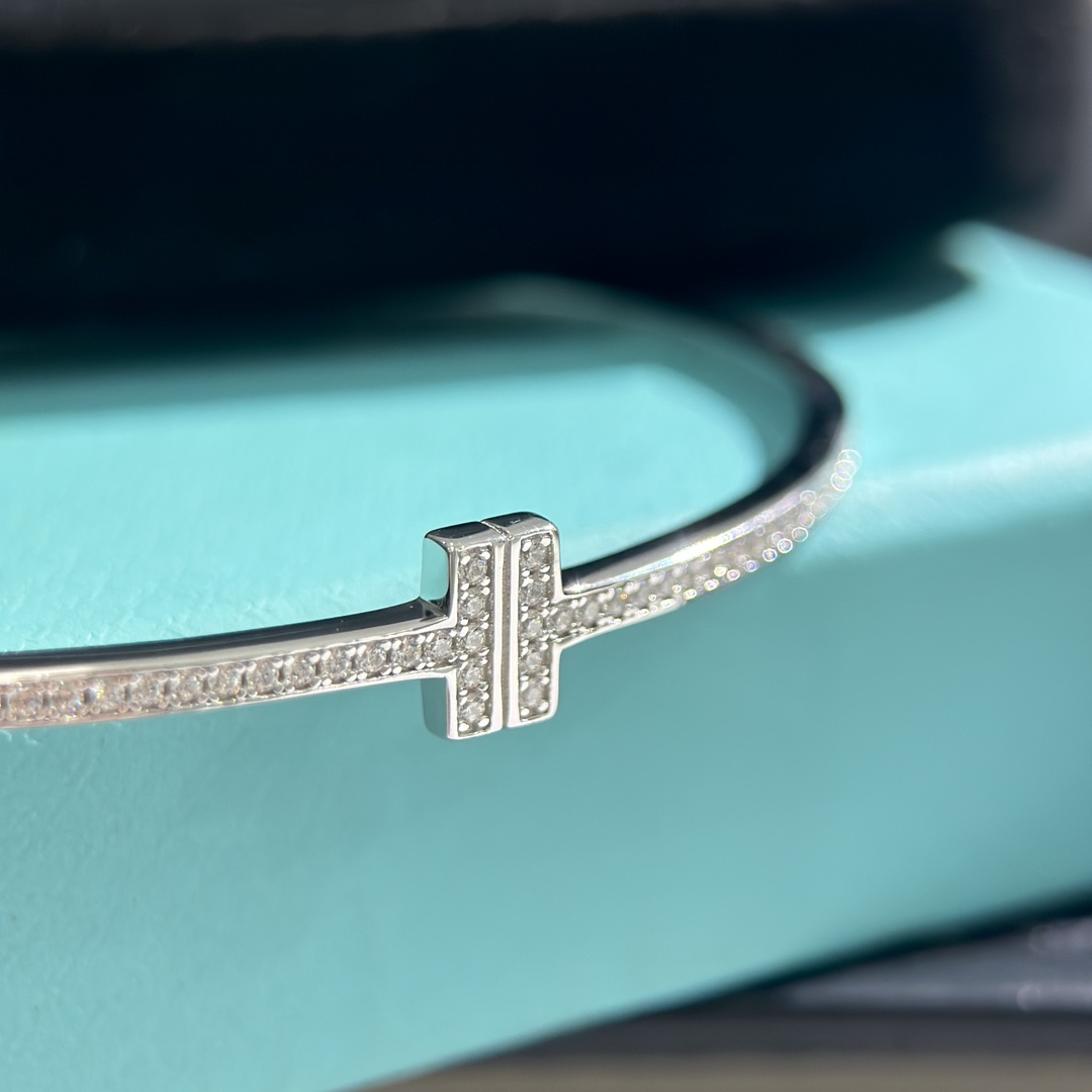 Tiffany & Co. 18K White Gold T Hinged Wire Bangle Bracelet - DesignerGu