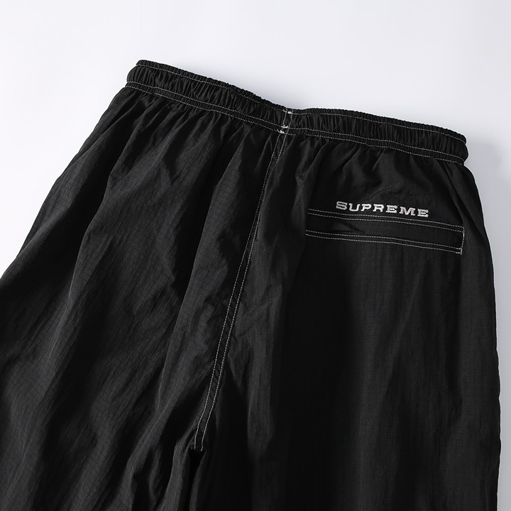 Supreme x Nike Ripstop Track Pant - DesignerGu