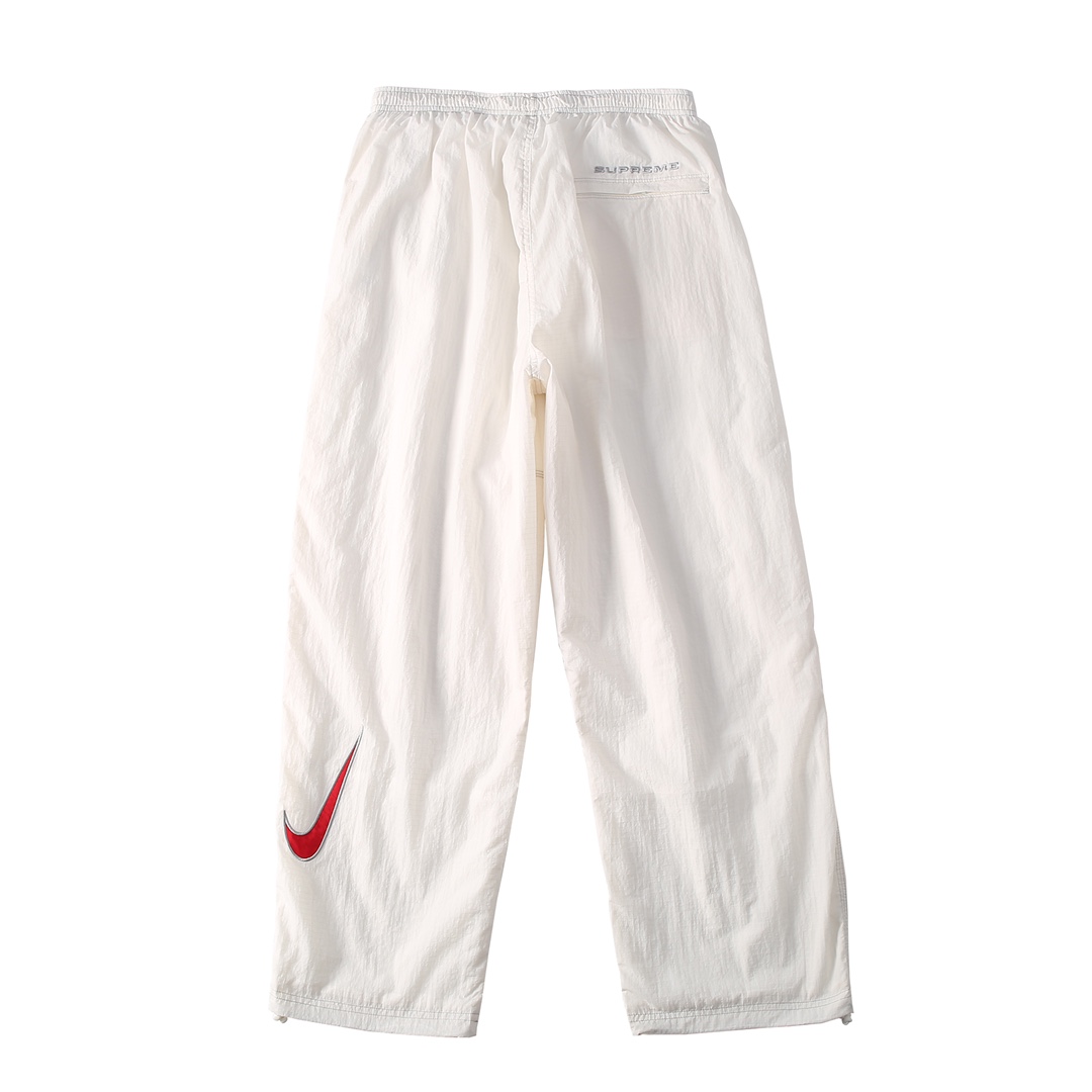 Supreme x Nike Ripstop Track Pant - DesignerGu