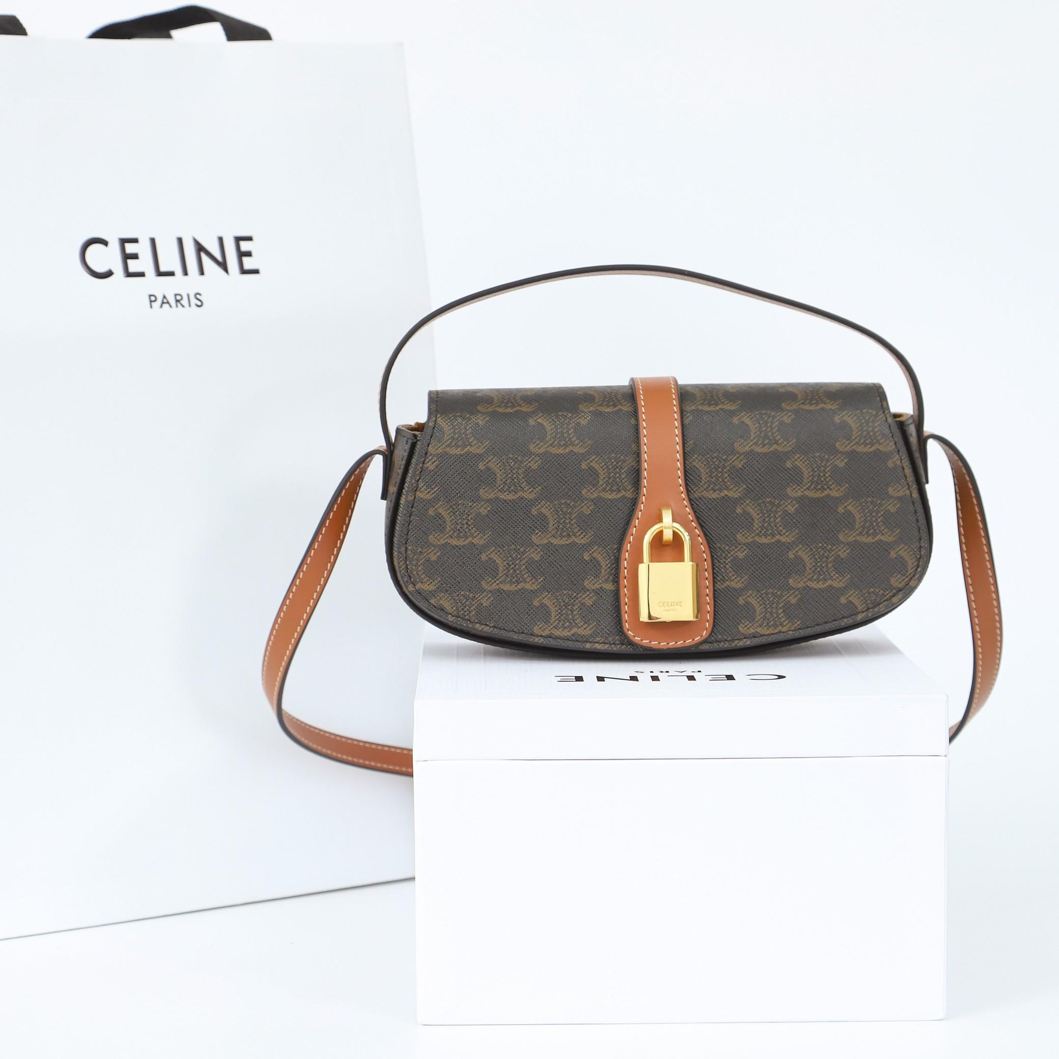 Celine Clutch On Strap Tabou In Triomphe Canvas And Calfskin - DesignerGu