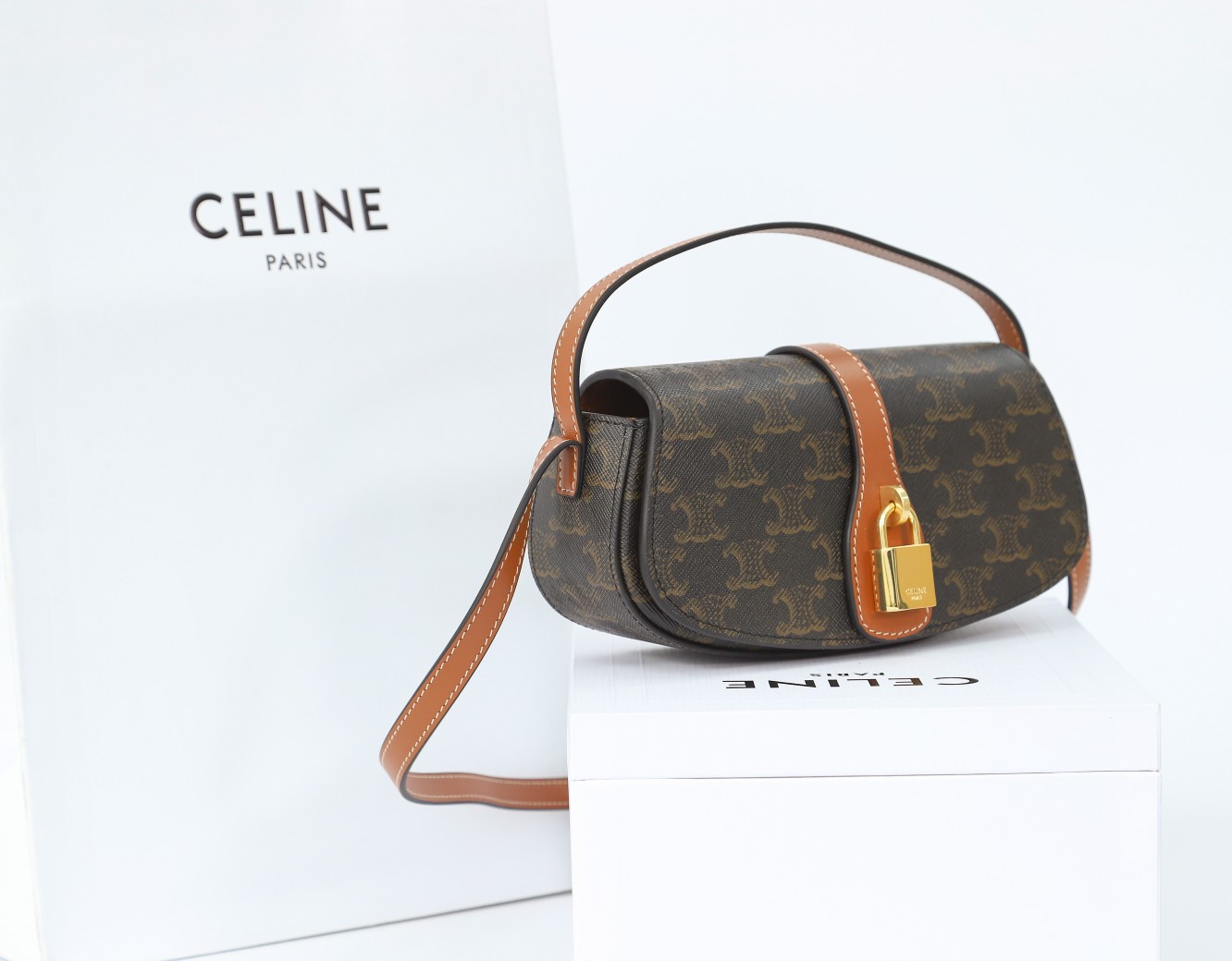 Celine Clutch On Strap Tabou In Triomphe Canvas And Calfskin - DesignerGu