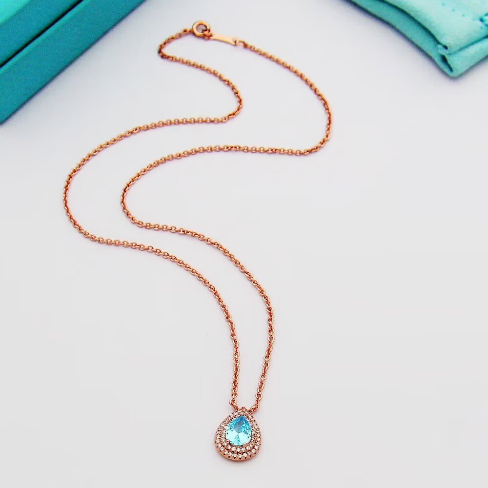 Tiffany & Co. Aquamarine and Diamond Pendant - DesignerGu