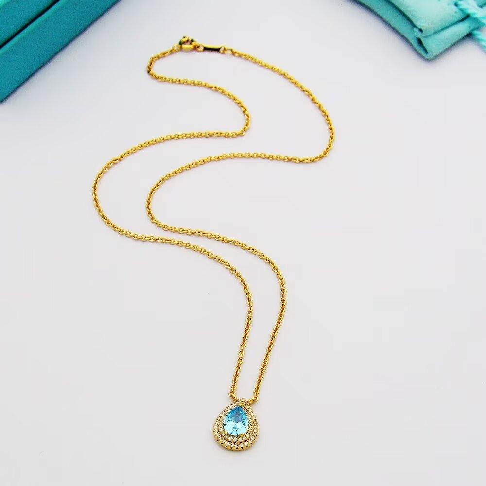 Tiffany & Co. Aquamarine and Diamond Pendant - DesignerGu