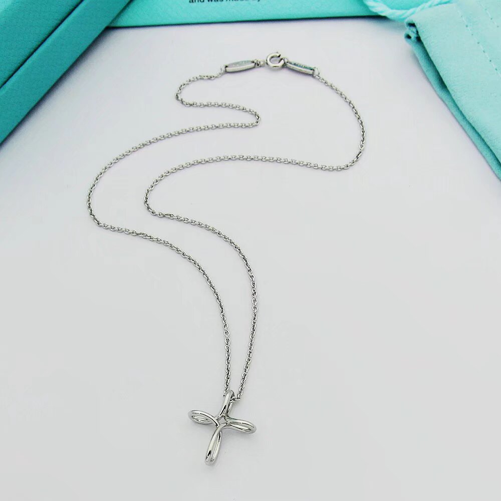 Tiffany & Co. Infinity Cross Pendant - DesignerGu