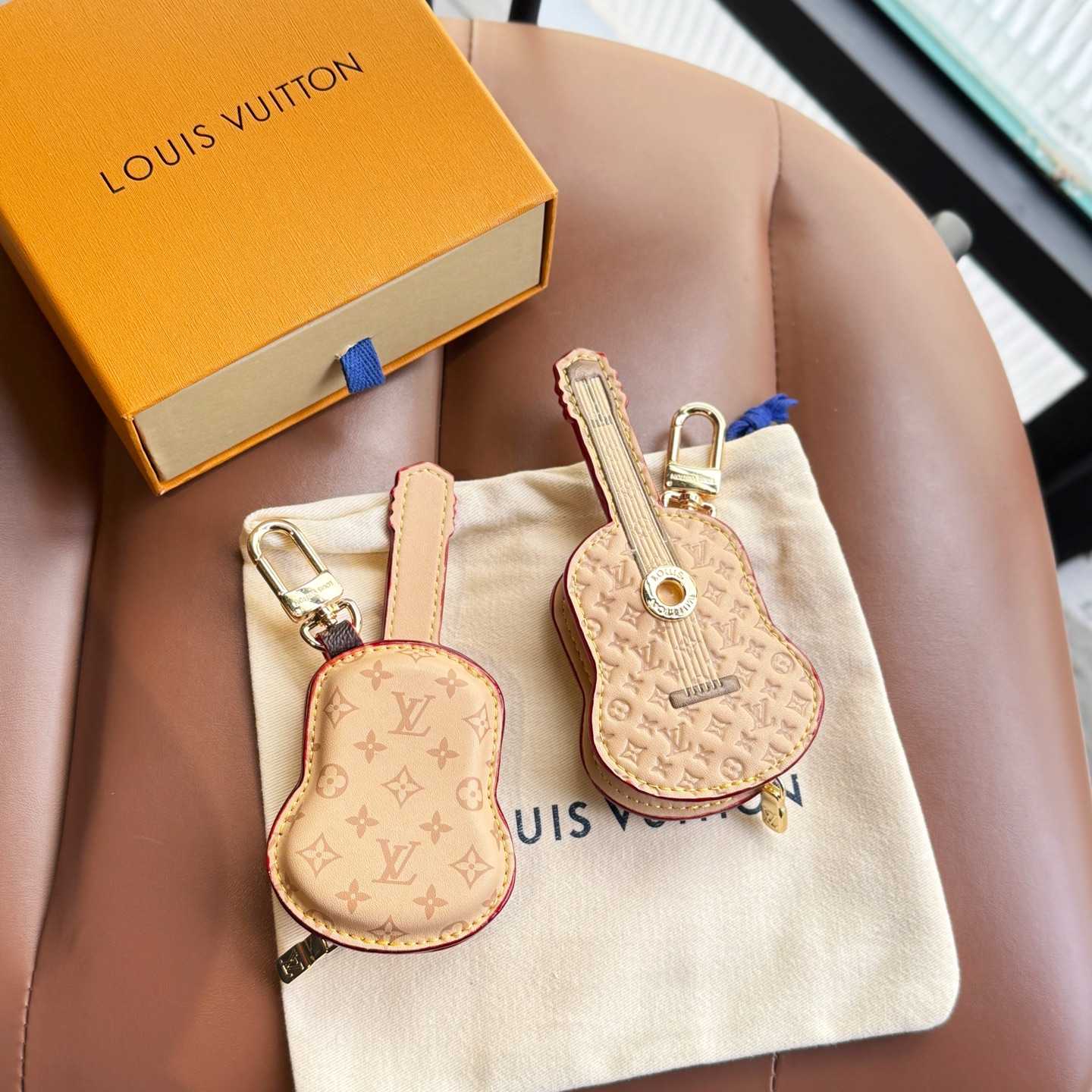 Louis Vuitton Guitar Pouch Bag Charm   M02032 - DesignerGu