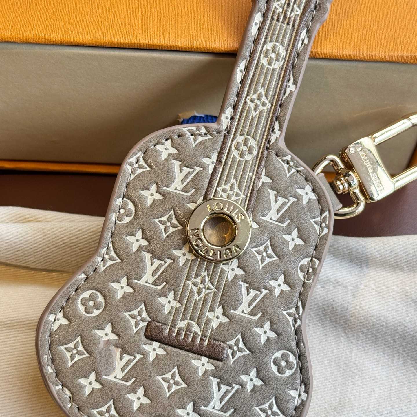 Louis Vuitton Guitar Pouch Bag Charm   M02032 - DesignerGu