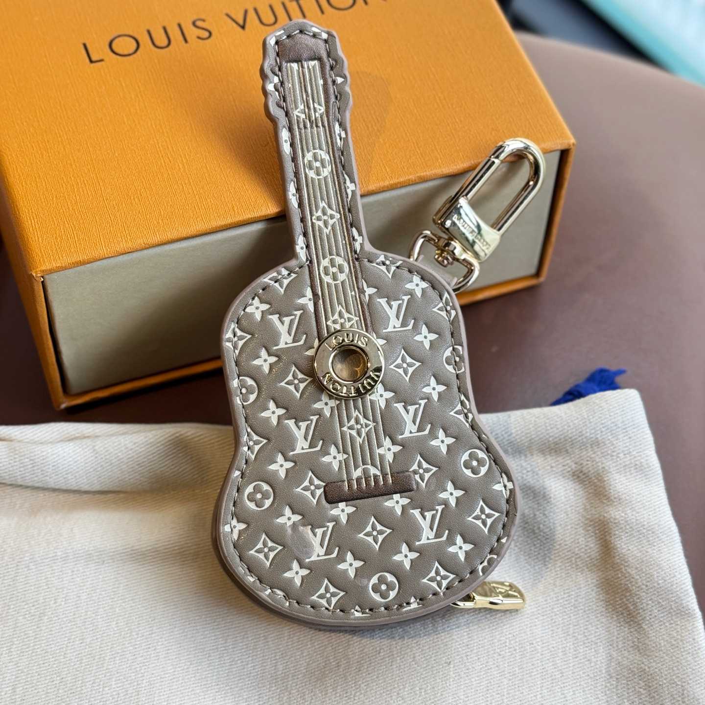 Louis Vuitton Guitar Pouch Bag Charm   M02032 - DesignerGu