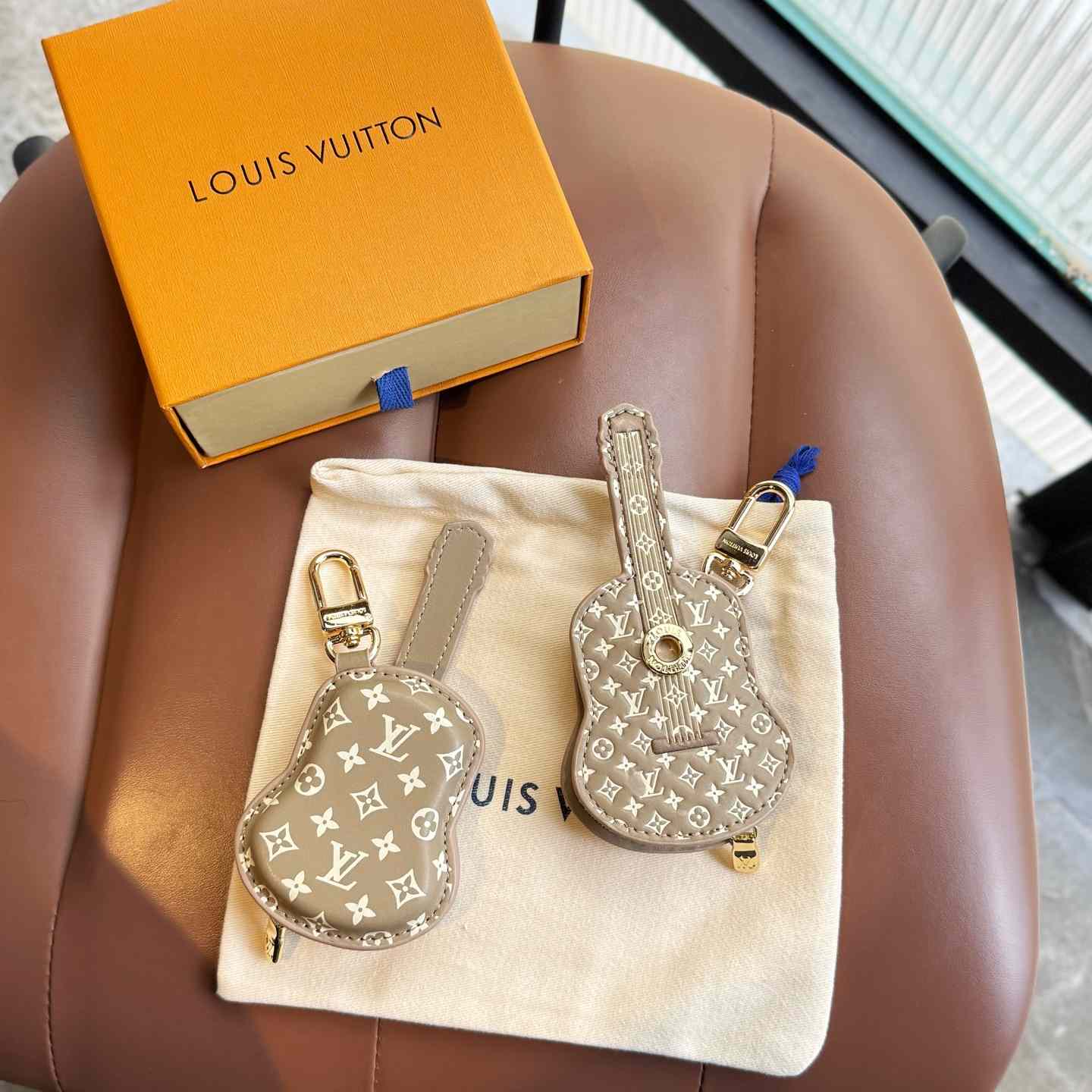 Louis Vuitton Guitar Pouch Bag Charm   M02032 - DesignerGu