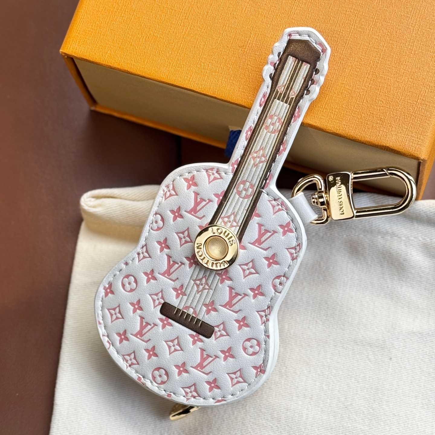 Louis Vuitton Guitar Pouch Bag Charm   M02032 - DesignerGu