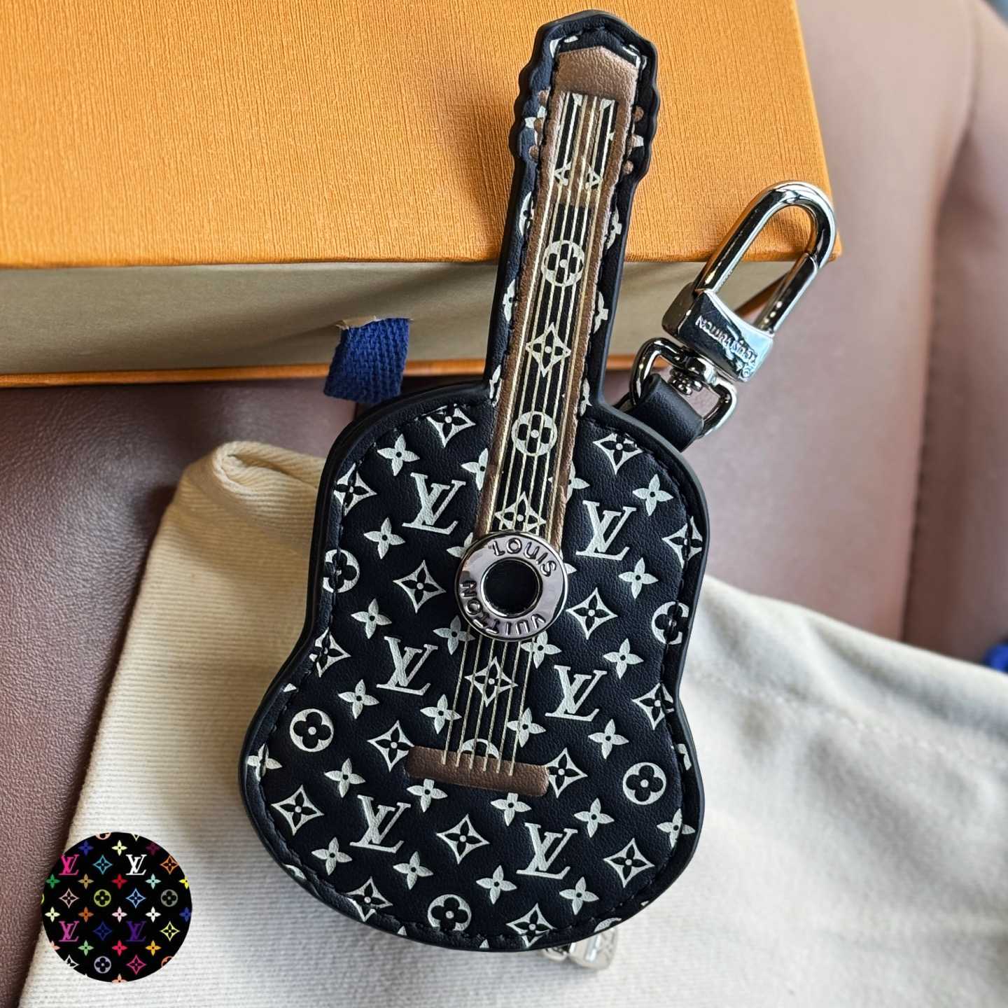 Louis Vuitton Guitar Pouch Bag Charm   M02032 - DesignerGu