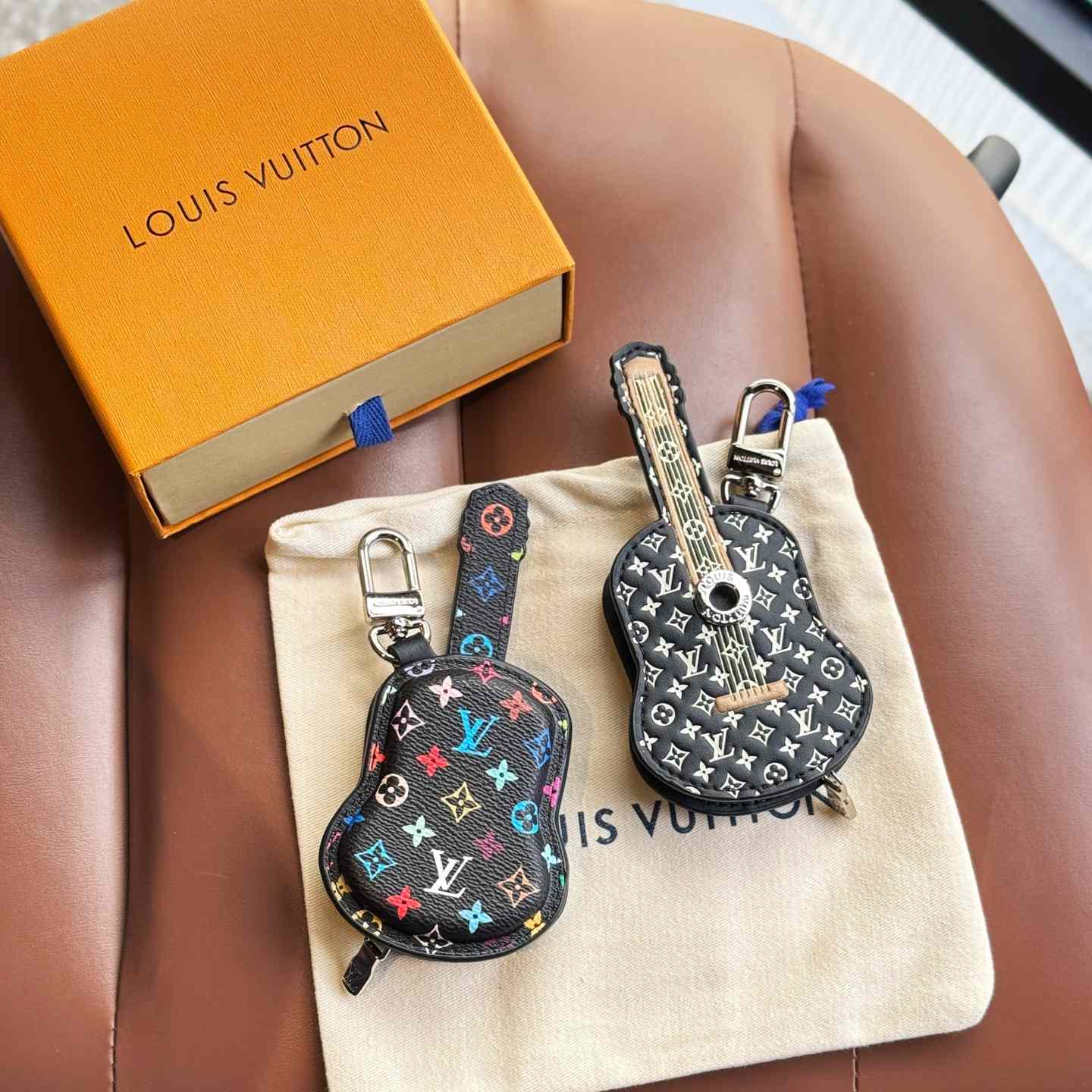 Louis Vuitton Guitar Pouch Bag Charm   M02032 - DesignerGu