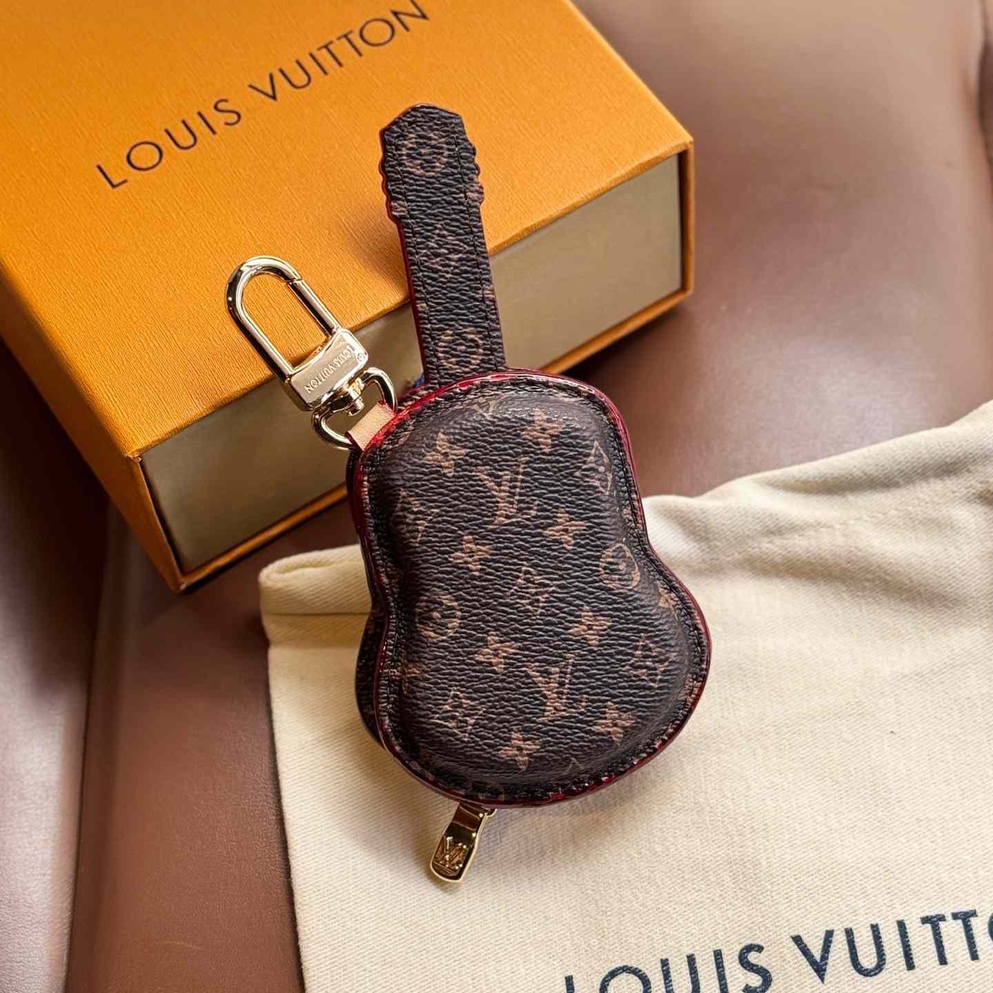 Louis Vuitton Guitar Pouch Bag Charm   M02032 - DesignerGu