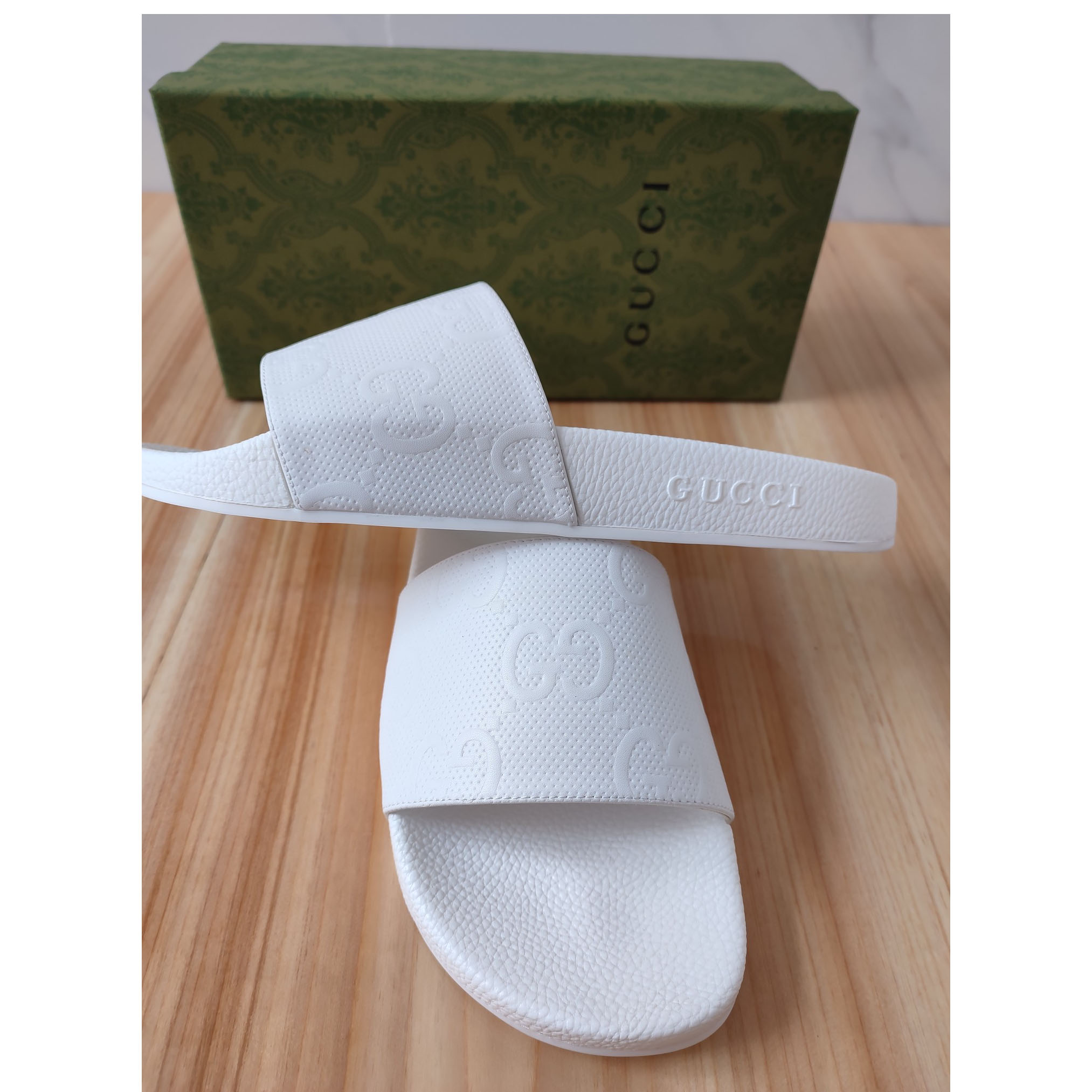 Gucci Logo Rubber Slide Sandal In White - DesignerGu