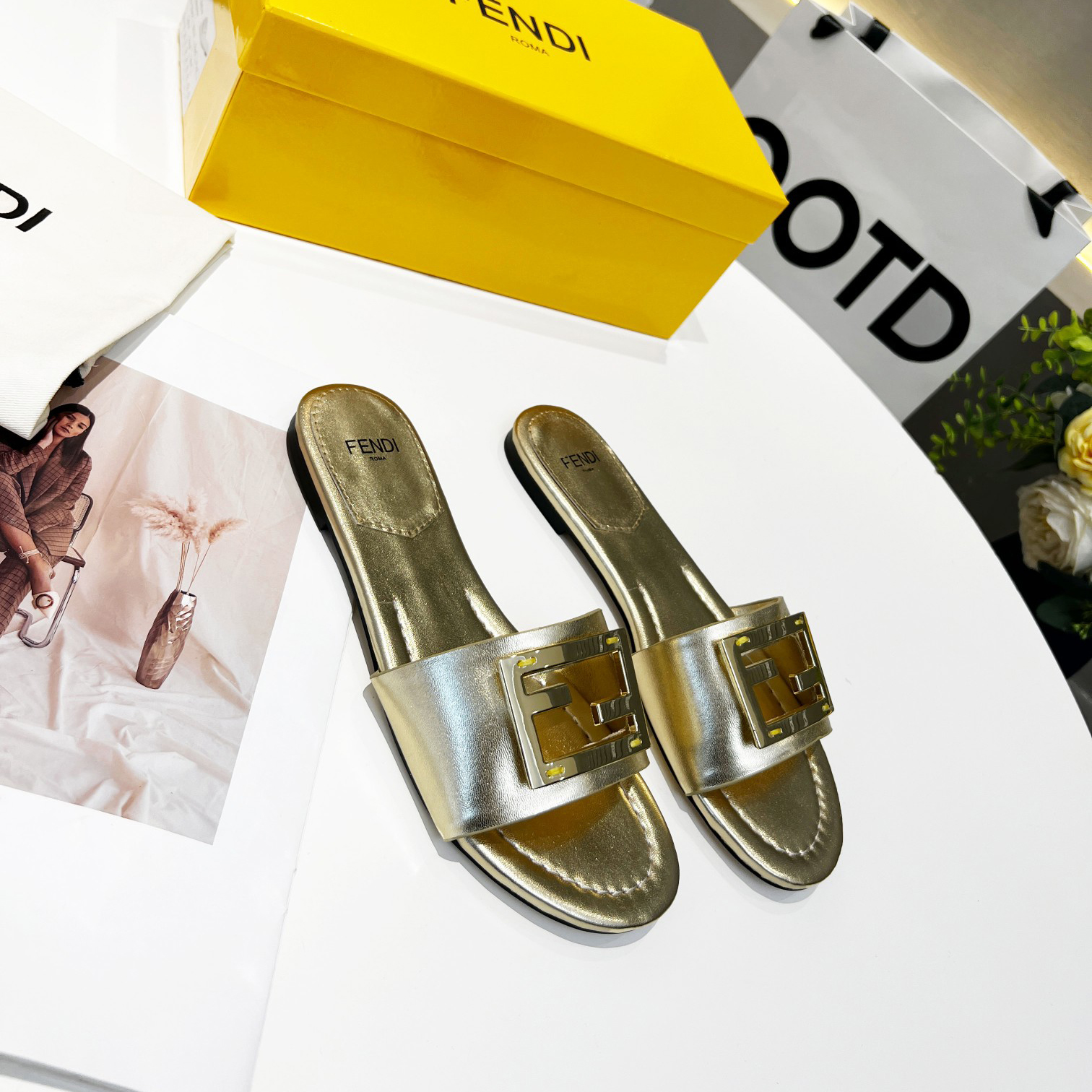 Fendi Baguette Gold nappa leather slides - DesignerGu