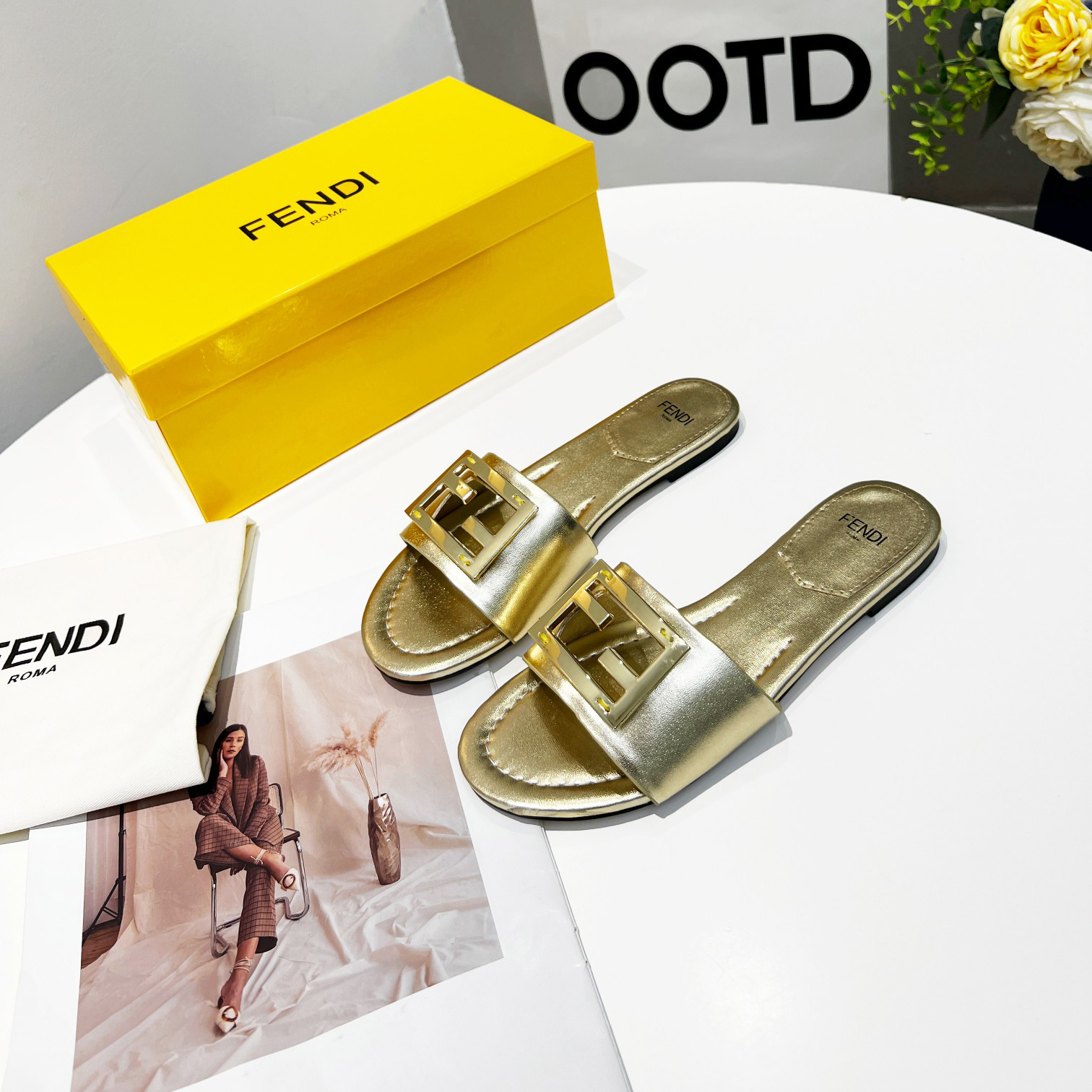 Fendi Baguette Gold nappa leather slides - DesignerGu