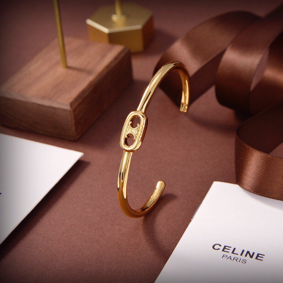 Celine Maillon Triomphe Thin Cuff In Brass With Gold Finish - DesignerGu