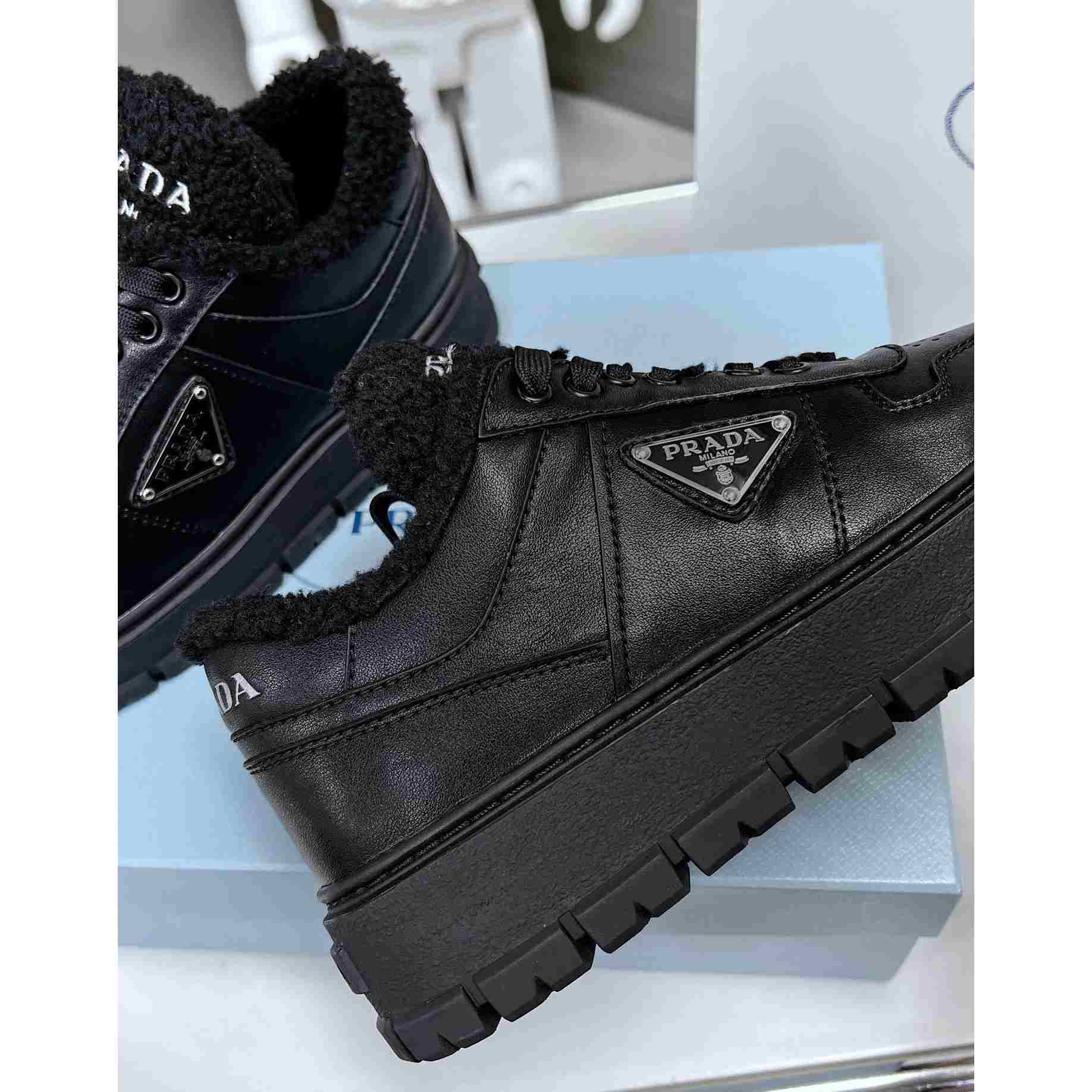 Prada Leather And Shearling Sneakers - DesignerGu