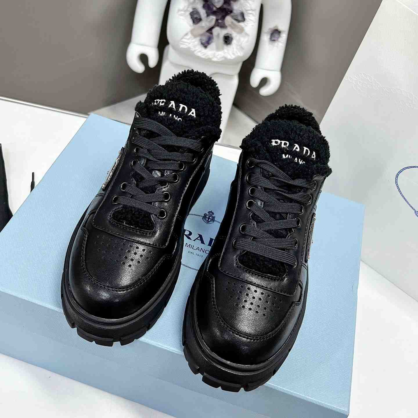 Prada Leather And Shearling Sneakers - DesignerGu