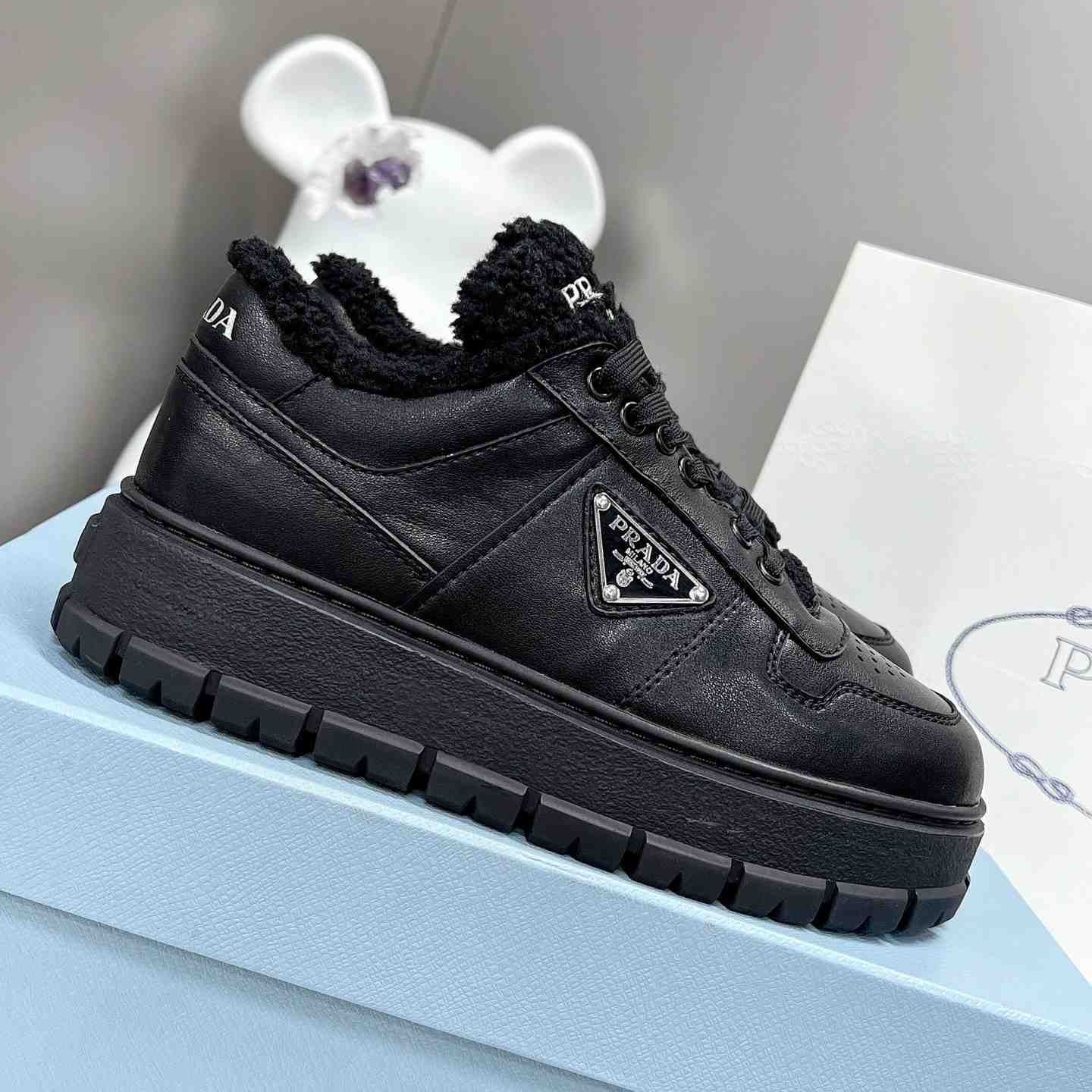 Prada Leather And Shearling Sneakers - DesignerGu