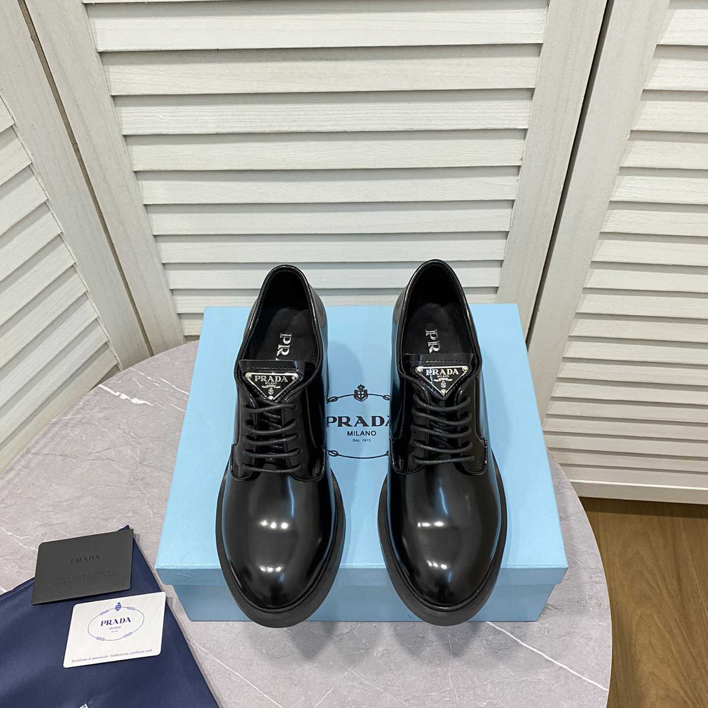 Prada Heeled Brushed Leather Lace-Ups - DesignerGu