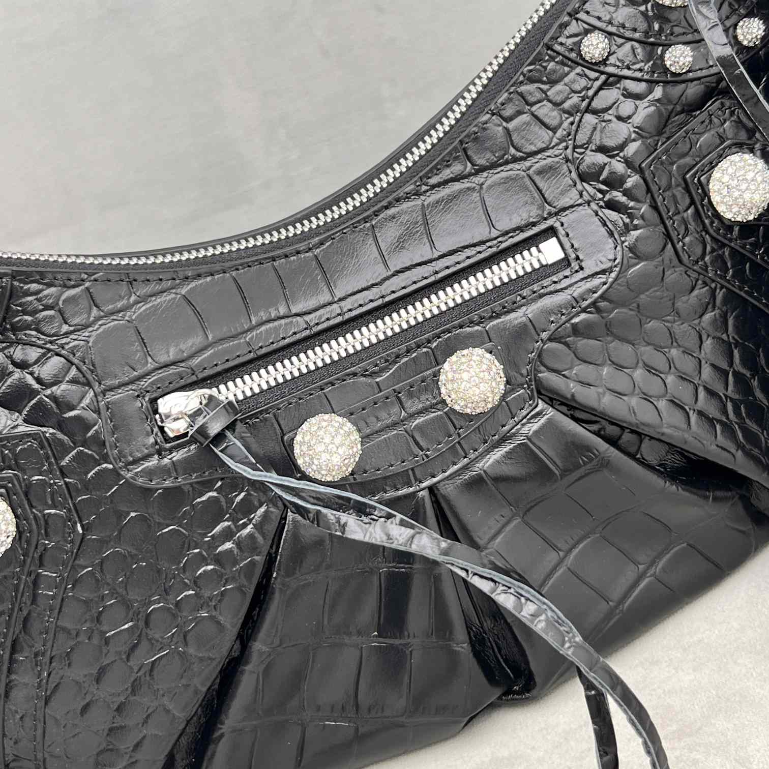 Balenciaga Women's Le Cagole Small Shoulder Bag Metallized Crocodile Embossed With Rhinestones In Black - DesignerGu