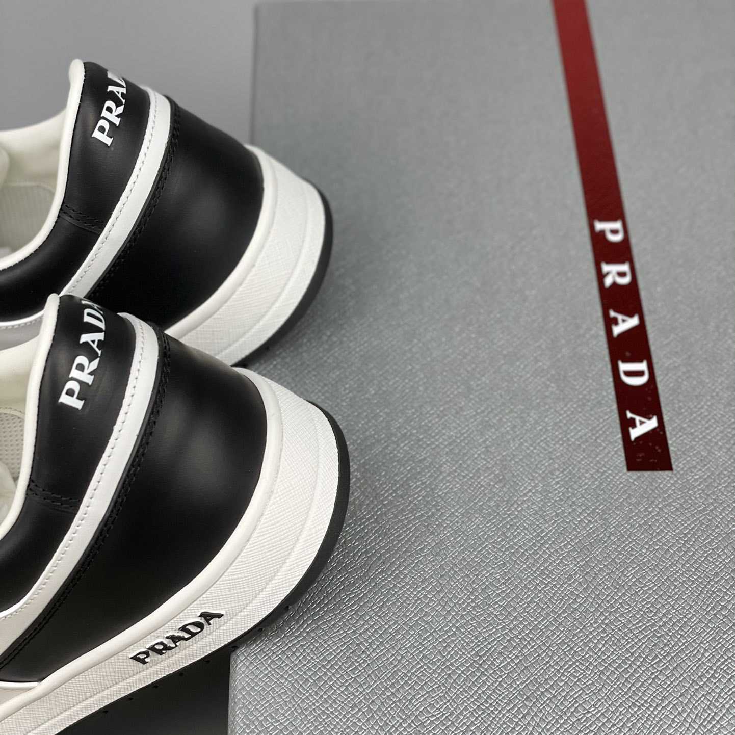 Prada Downtown Leather Sneakers - DesignerGu