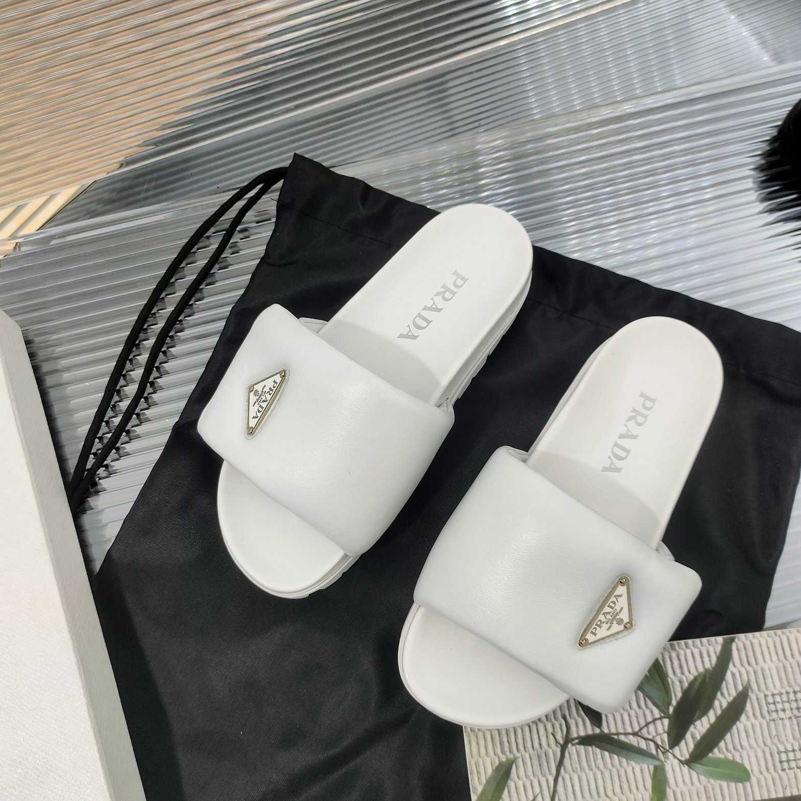 Prada Soft Padded Nappa Leather Slides - DesignerGu