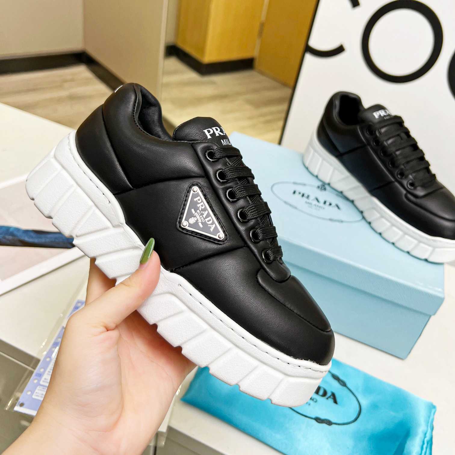 Prada Padded Nappa Leather Sneakers - DesignerGu